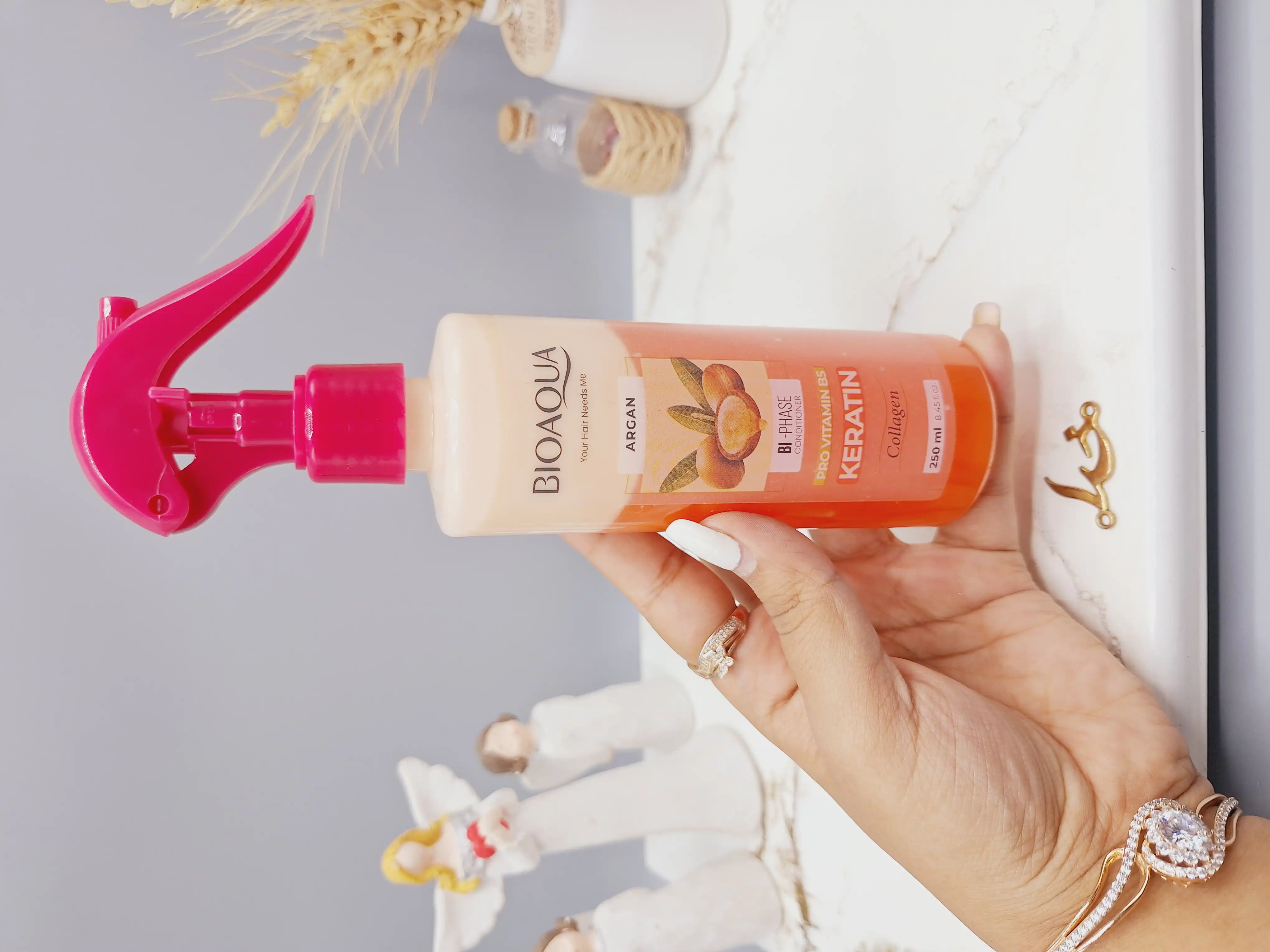 اسپری دو فاز کراتین به همراه روغن آرگان برند بیوآکوا کد 6088(رنگ گلهبی)