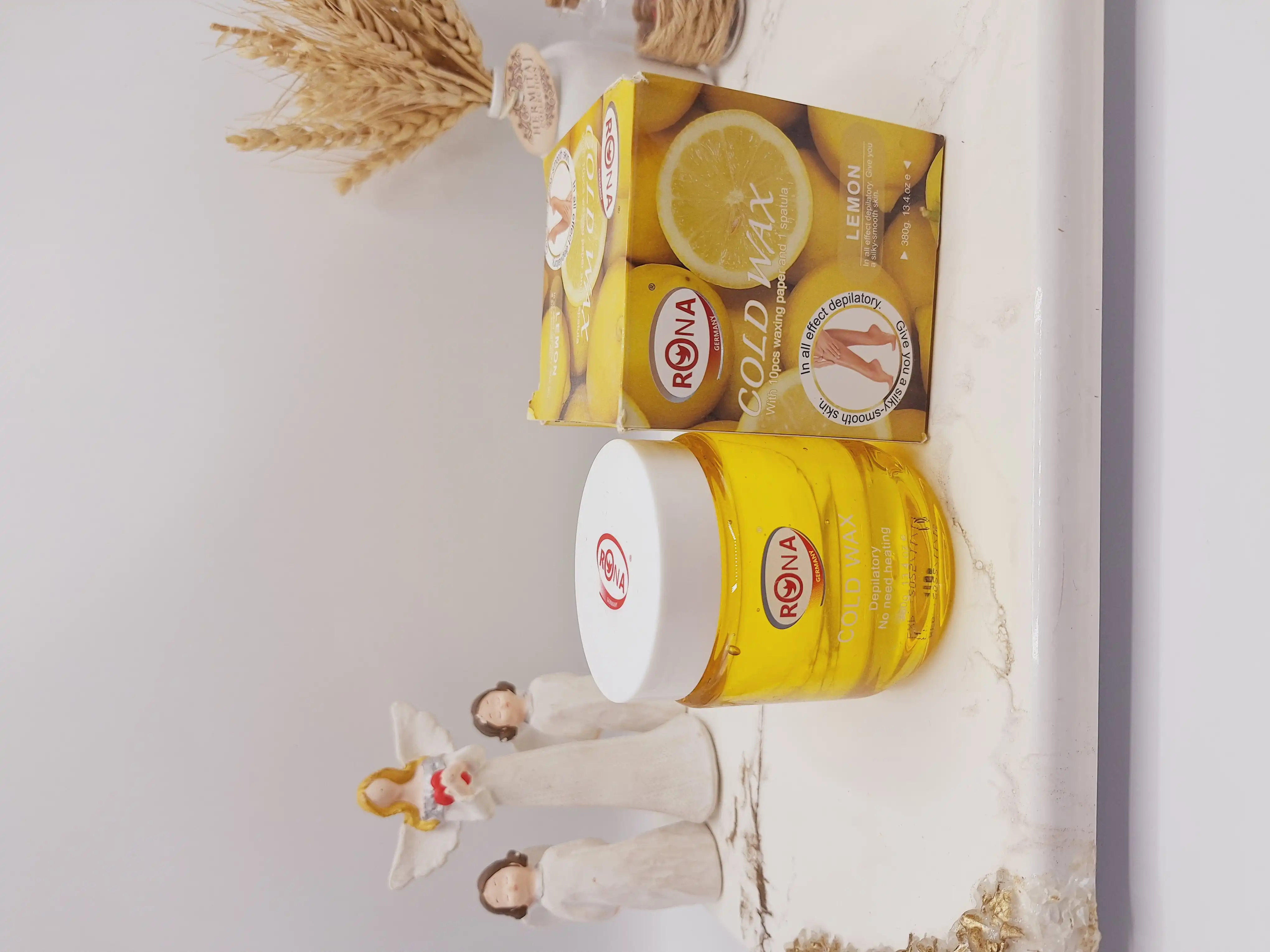 موم سرد با کاغذ اپیلاسیون همراه با کاردک رایحه لیمو برند RONA کد 3152