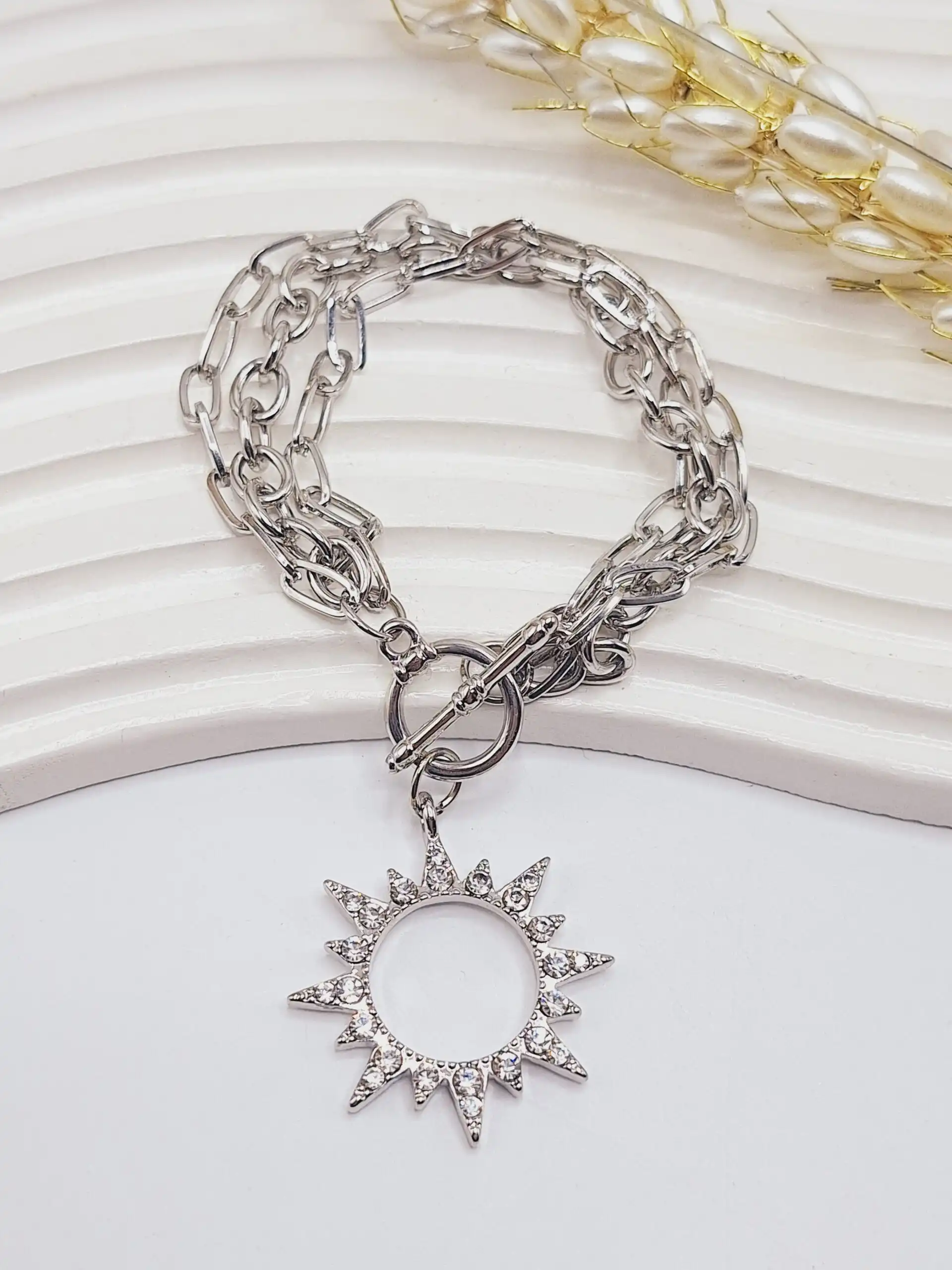 دستبند زنجیری طرح خورشید نقره ای