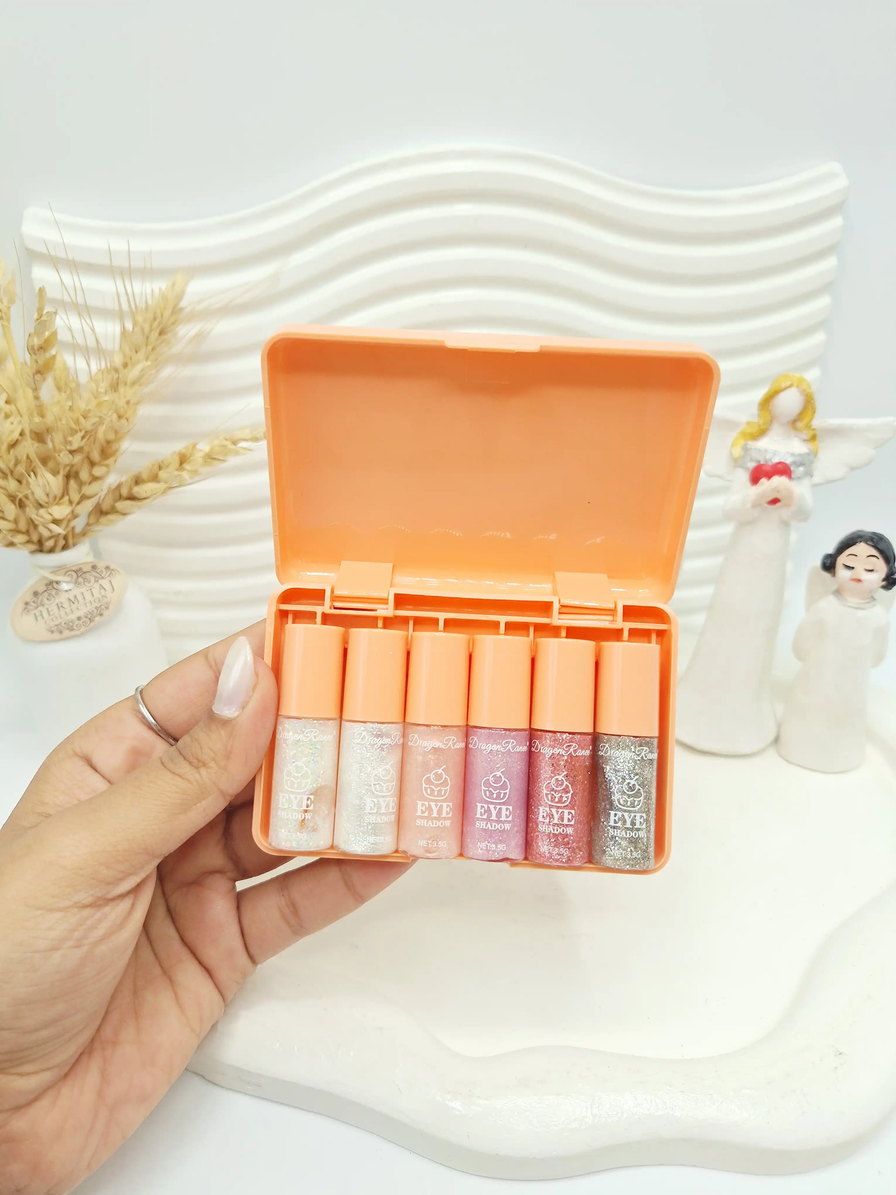 پک سایه چشم گلیتری طرح خرس دوناتی برند دراگون رانی dragon ranee کد 7824