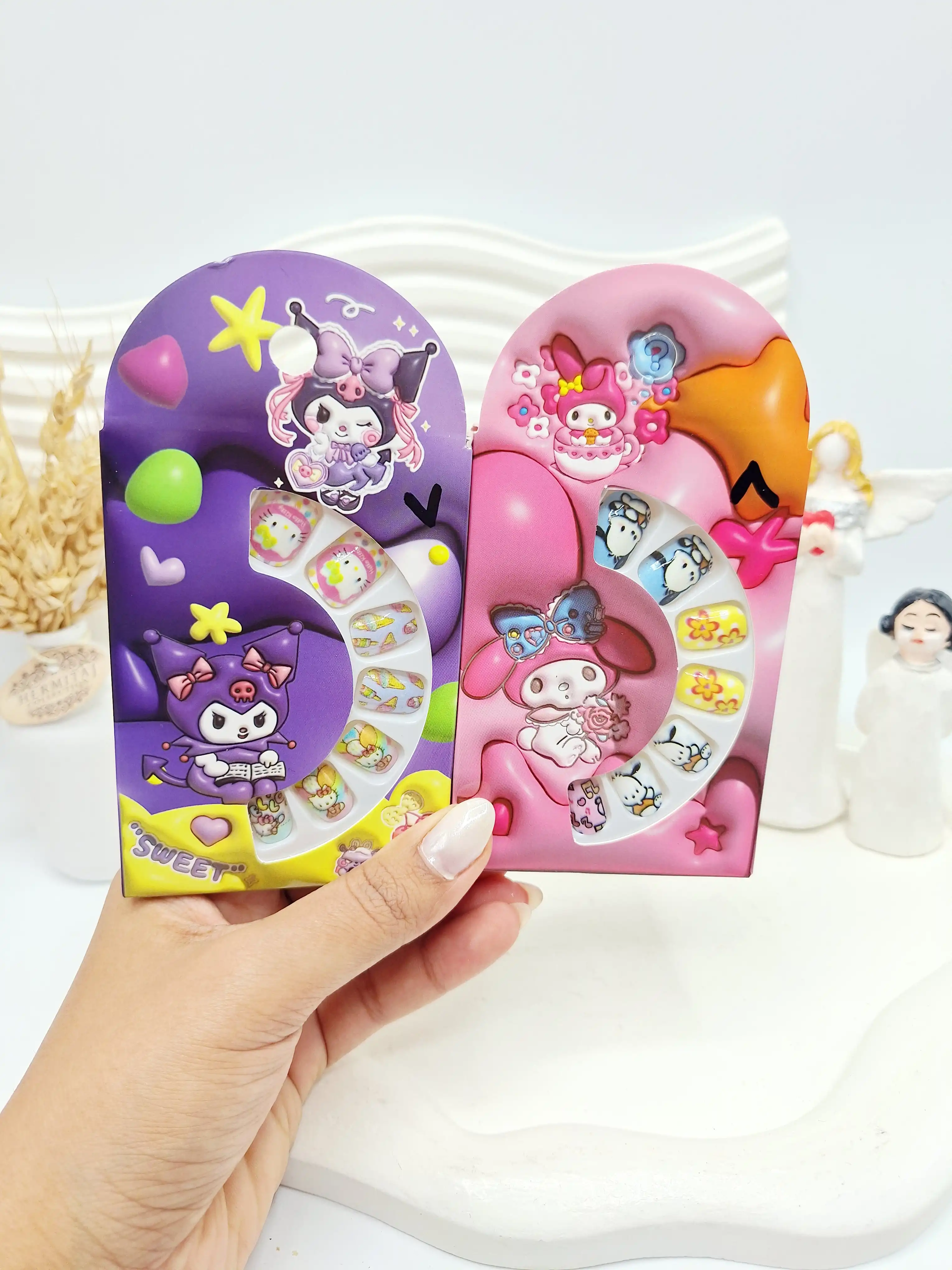 پک ناخن مصنوعی بچگانه طرح جعبه کارتونی ارسال طرح ناخن رندم کد 7329