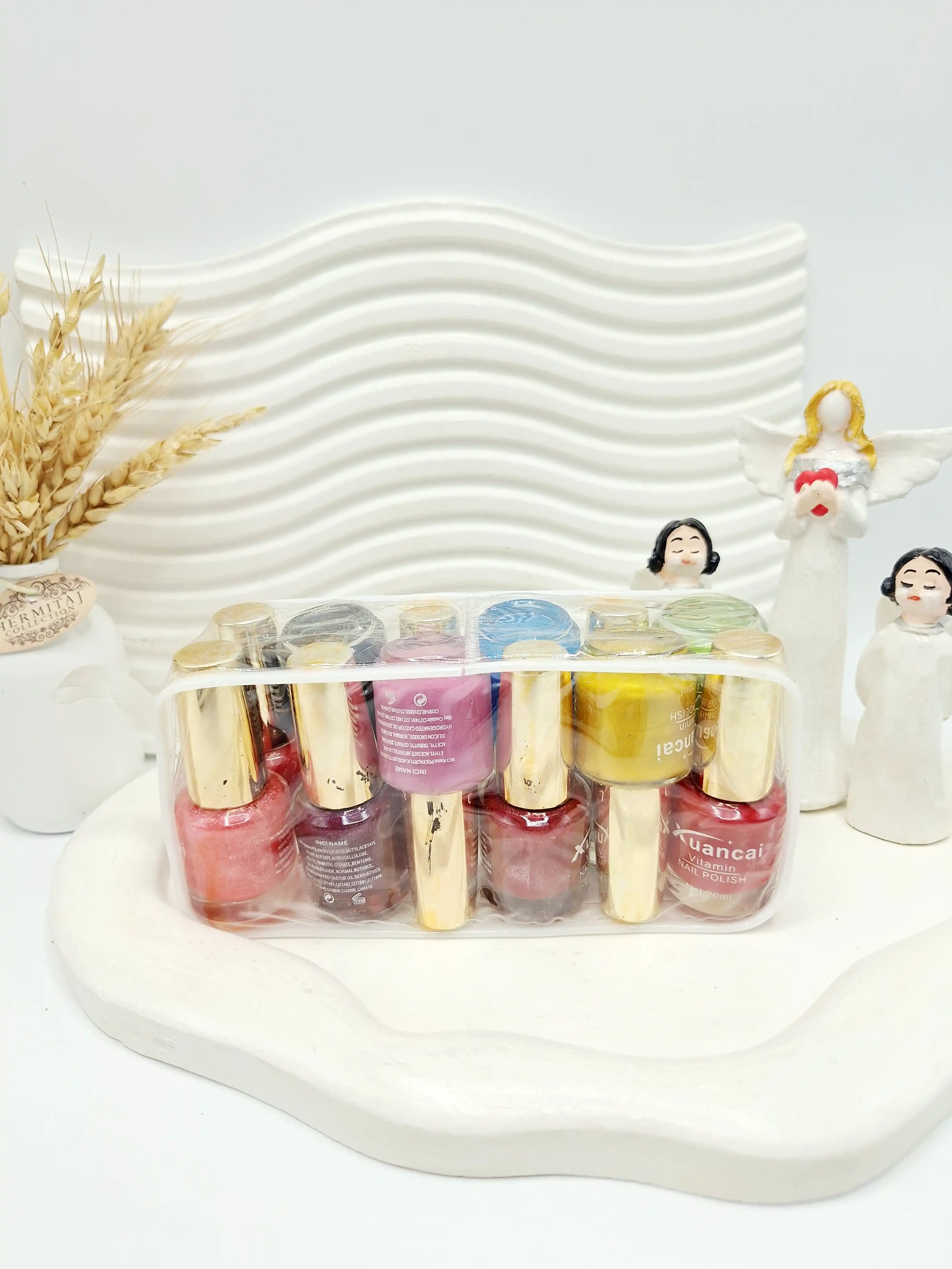 پک 12 تایی لاک ناخن Xuancai همراه کیف