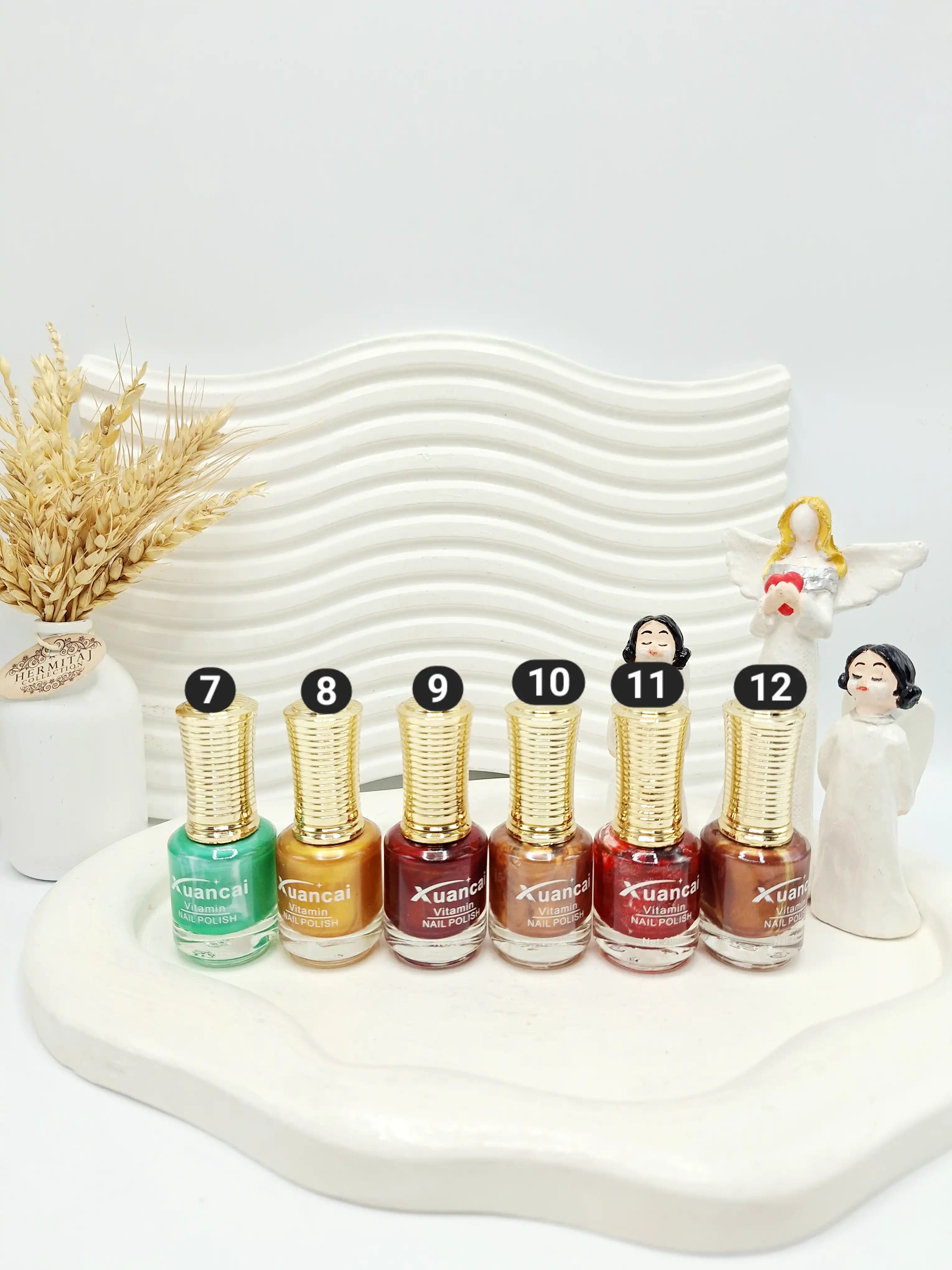 لاک ناخن دایره ای سر طلایی برند Xuancai کد 8055