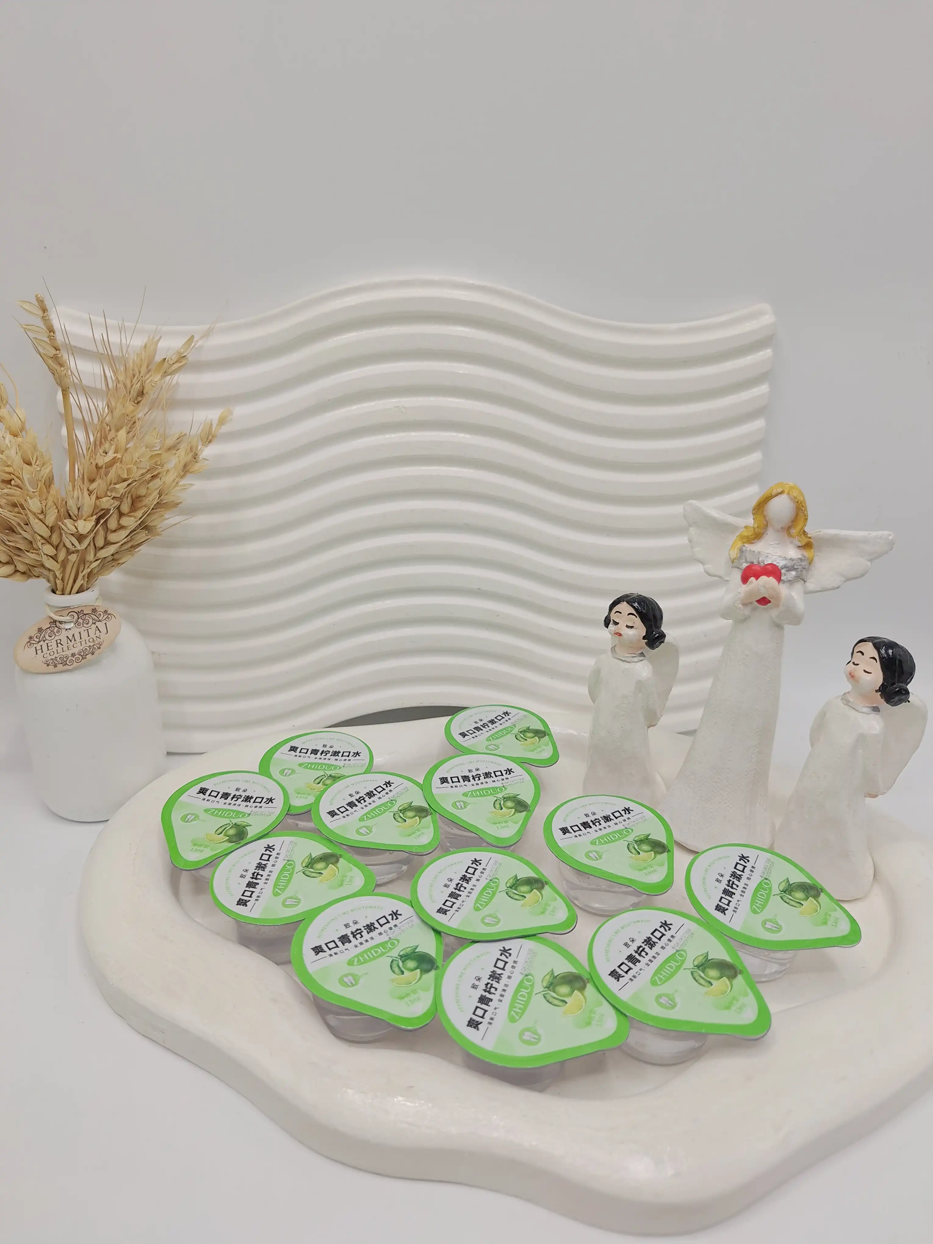 پک 12 تایی دهانشویه طراوت بخش لیمو ZHIDUO کد 3442