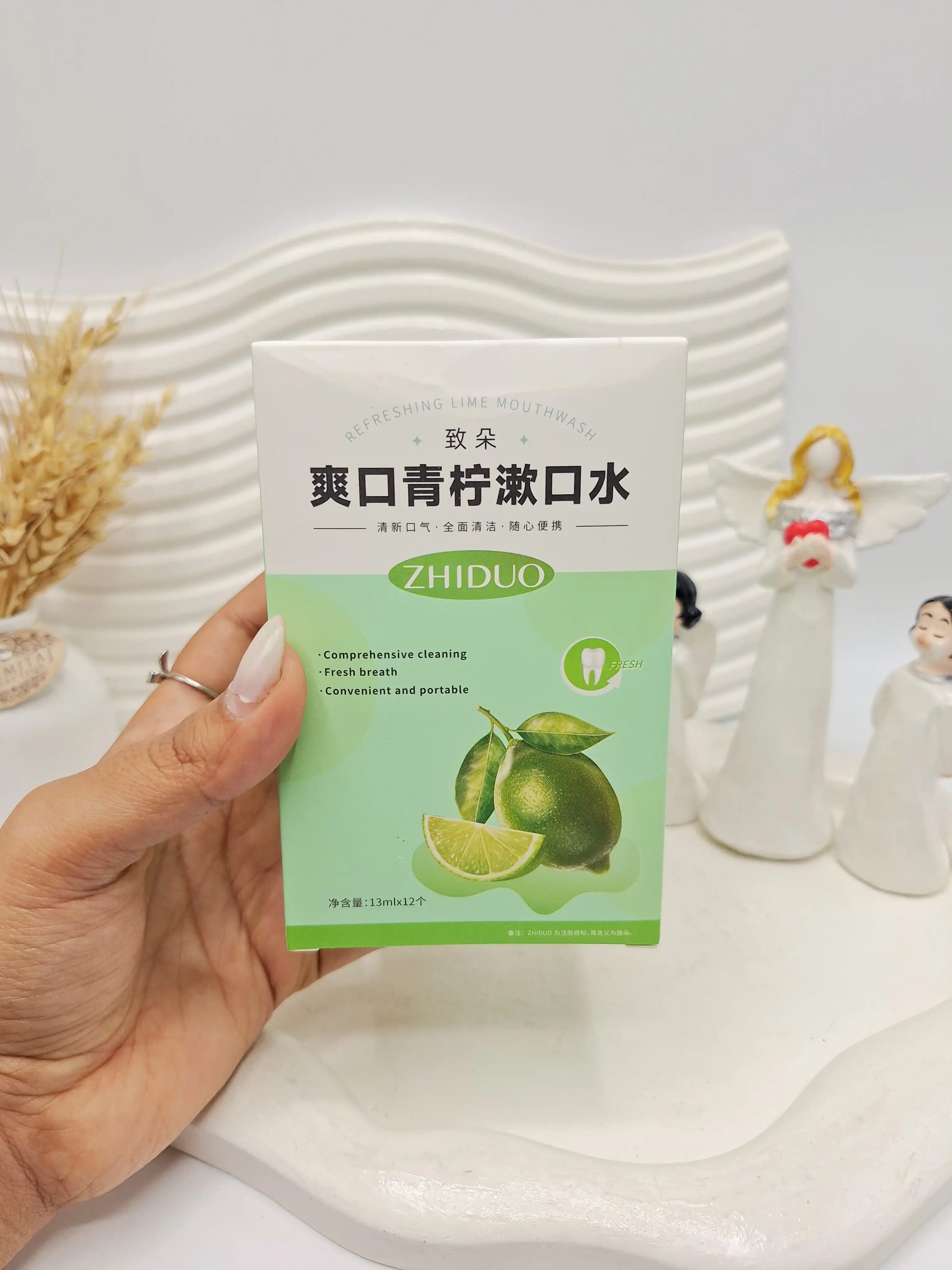 پک 12 تایی دهانشویه طراوت بخش لیمو ZHIDUO کد 3442