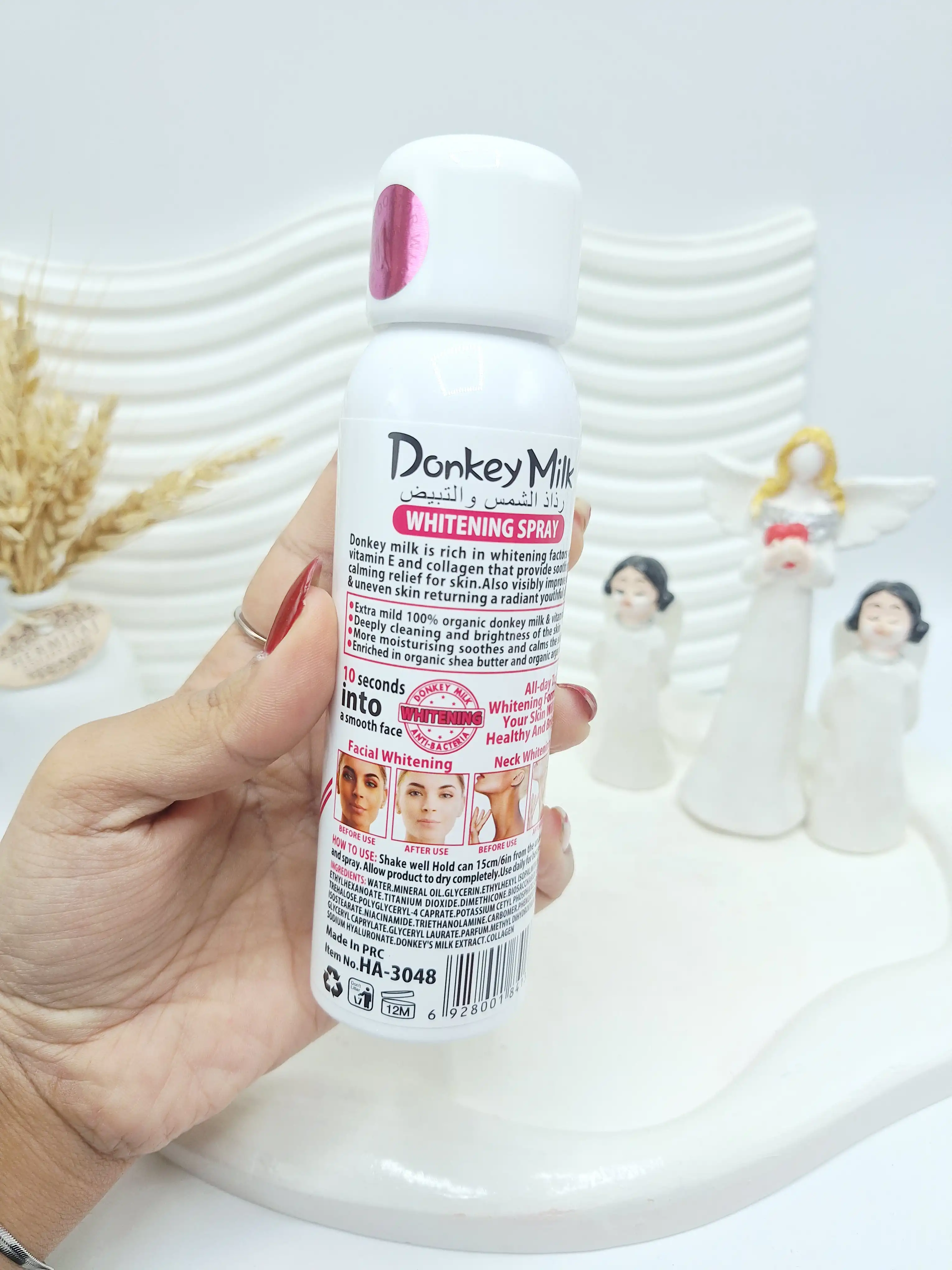 اسپری سفید کننده حاوی ضد آفتاب شیر الاغ برند وکالی اصلی کد 3048 (جلد صورتی)