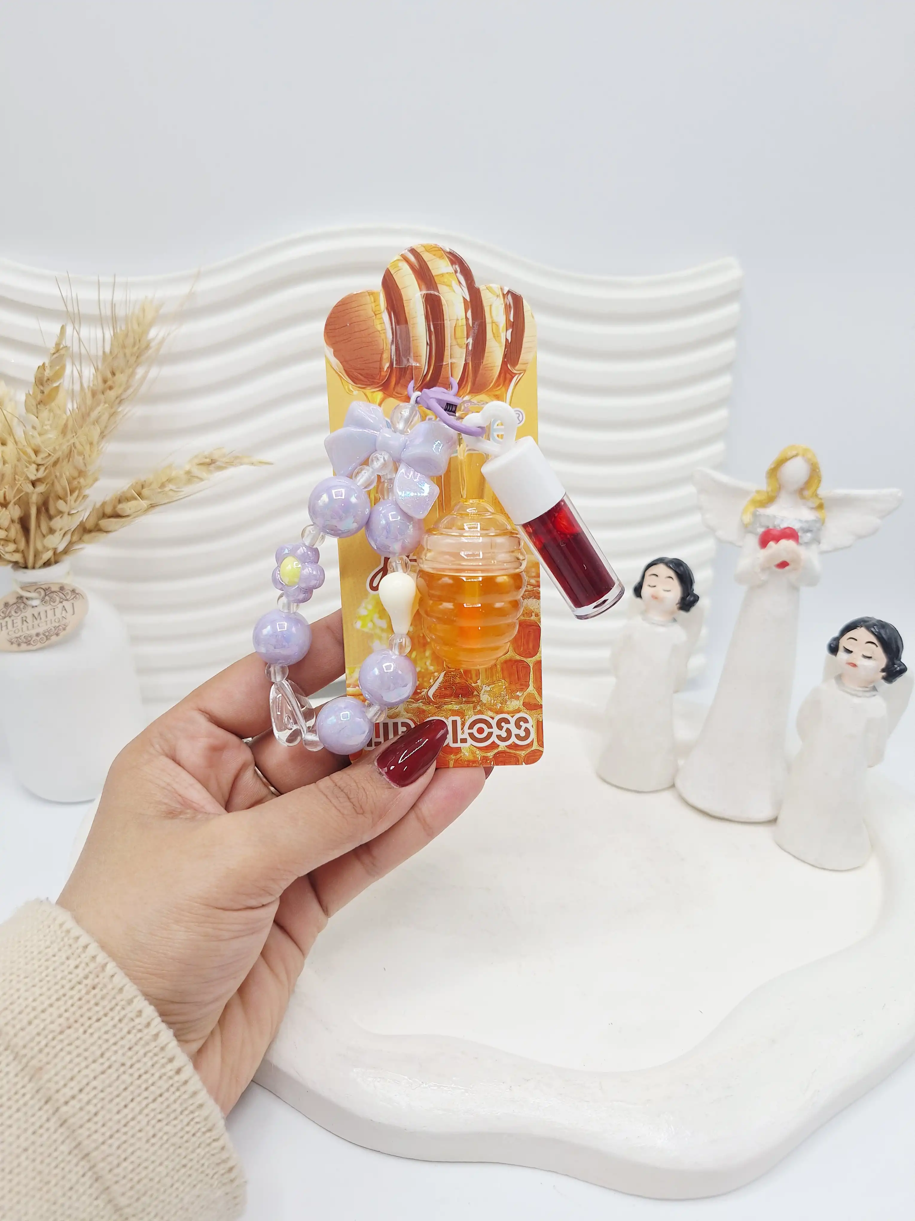 ست لیپ گلاس حرارتی عسل و تینت و دستبند برند APCKFLEE کد 040