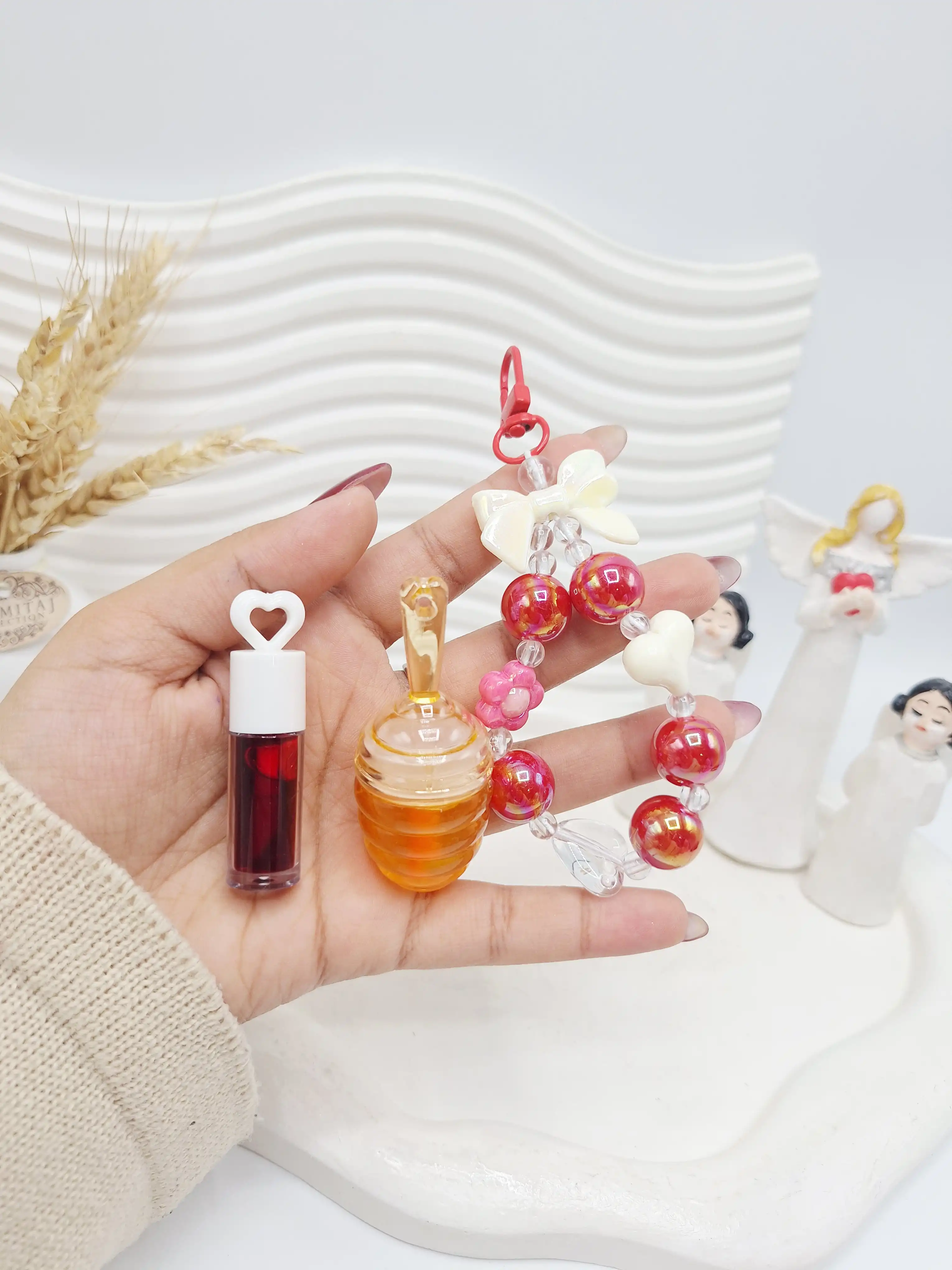 ست لیپ گلاس حرارتی عسل و تینت و دستبند برند APCKFLEE کد 040