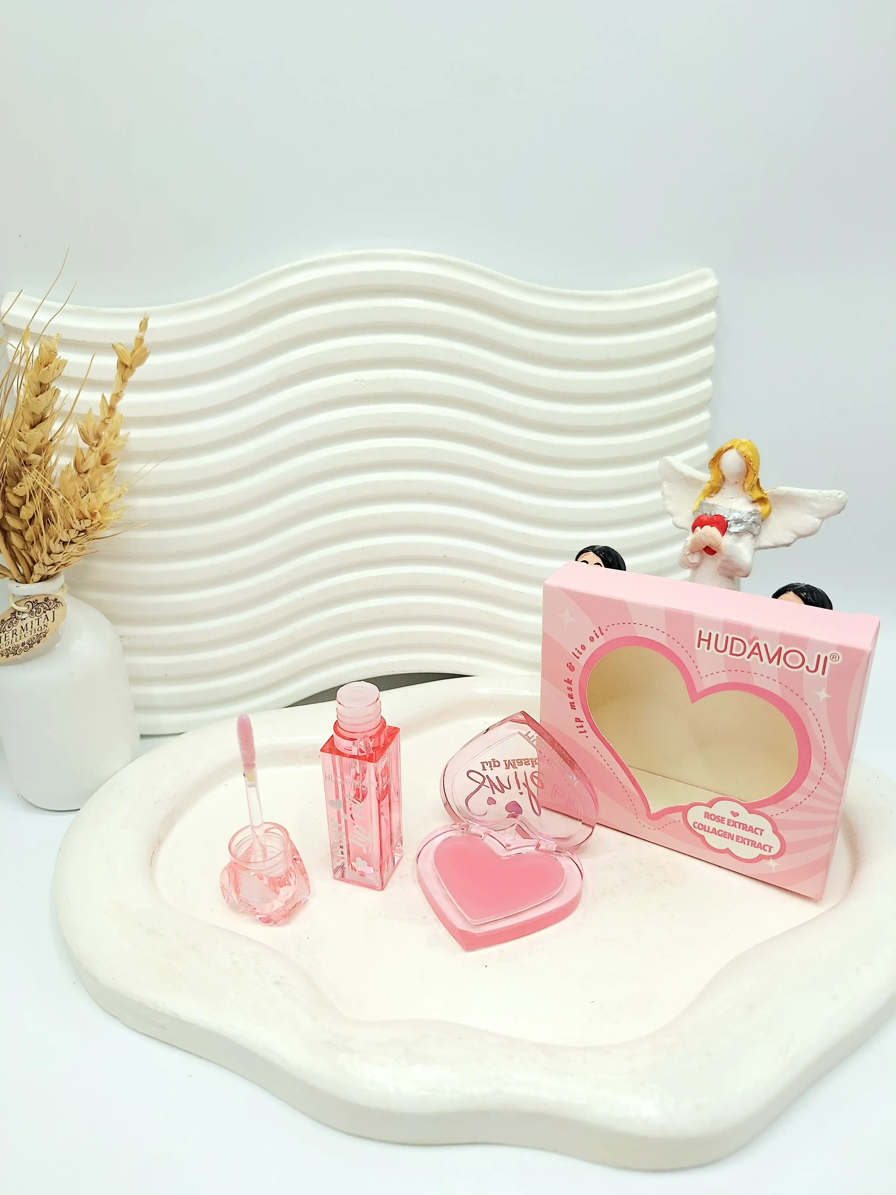 ست 2 تایی بالم لب و لیپ گلاس طرح قلبی برند هدا موجی کد 4421